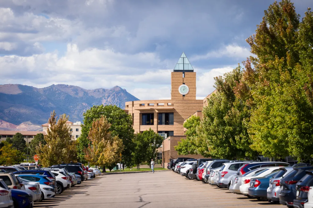 campus parking lot with el pomar center in the background